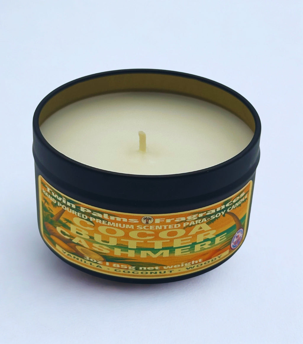 Twin Palms Fragrances Cocoa Butter Cashmere Candle in a tin with a label on a white background