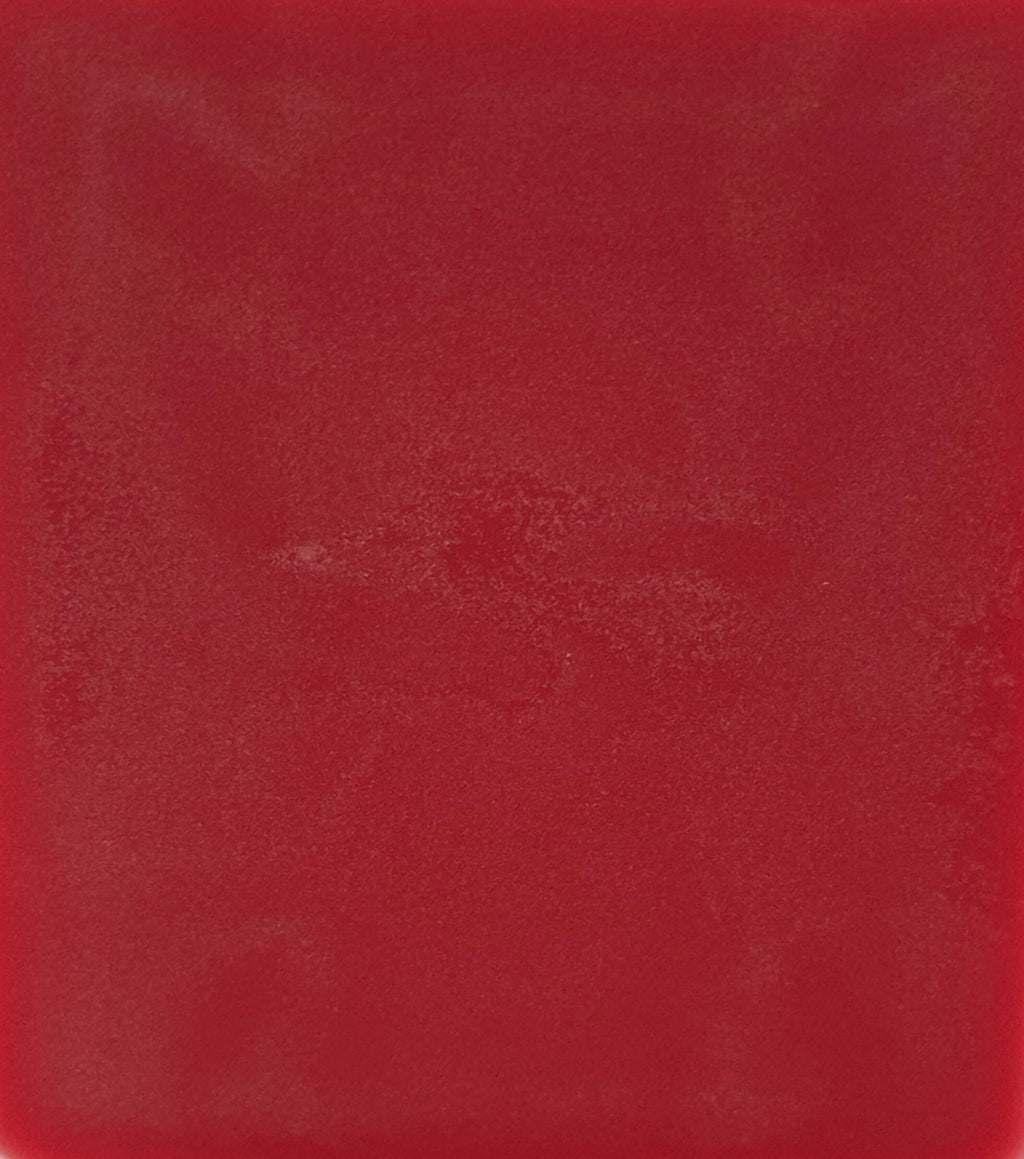 Solid red color swatch with a textured surface