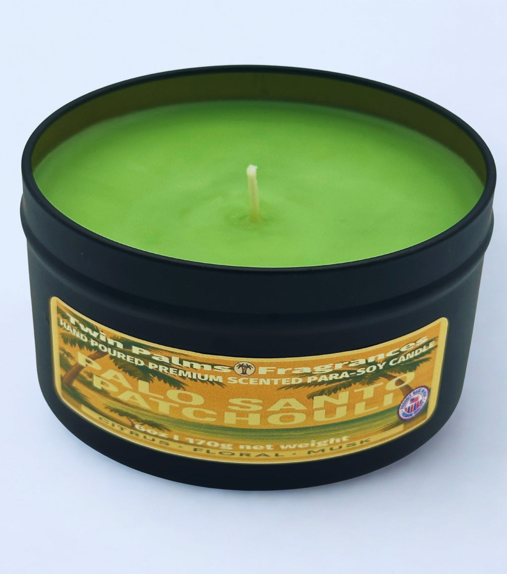 Twin palms Fragrances green candle Palo Santo Patchouli  in a black tin with a label on a white background