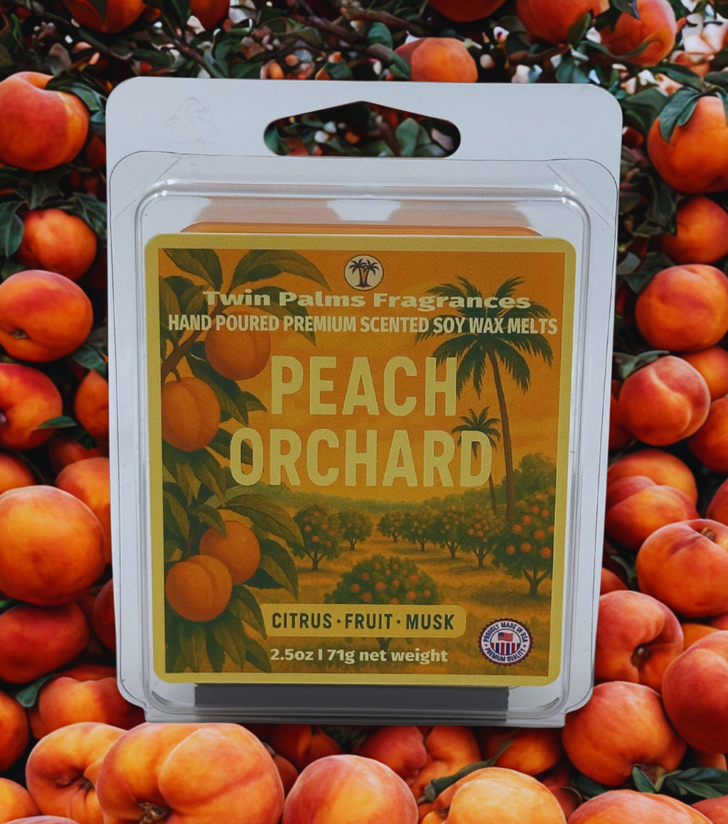 Packaging of Twin Palms Fragrances Peach Orchard wax melts surrounded by peaches.