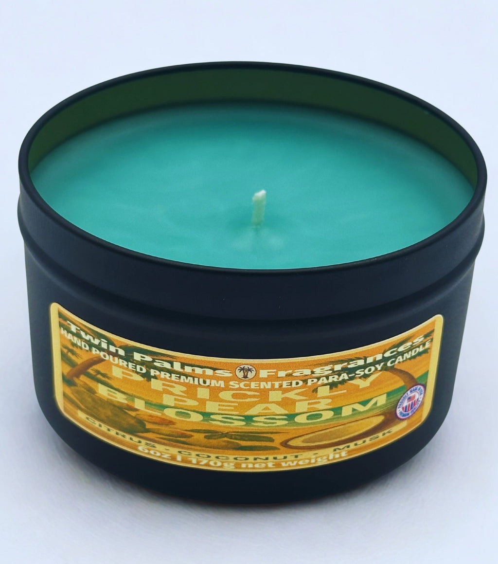 Twin Palms Fragrances candle Prickly Pear Blossom  in a tin with a label on a white background