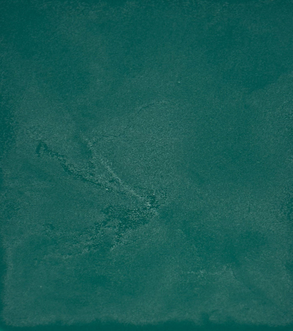 Solid teal color swatch with a textured pattern
