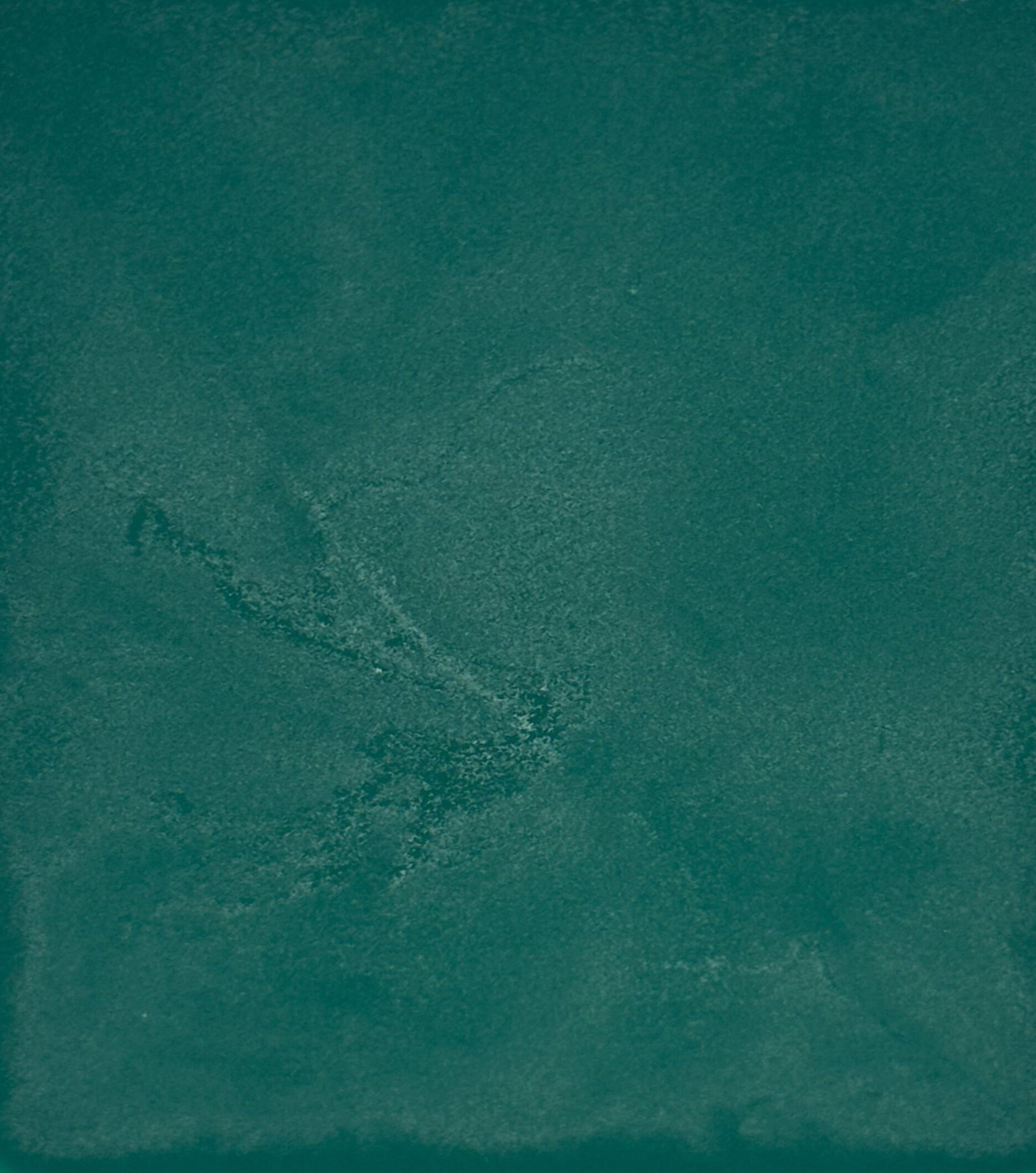 Solid teal color swatch with a textured pattern