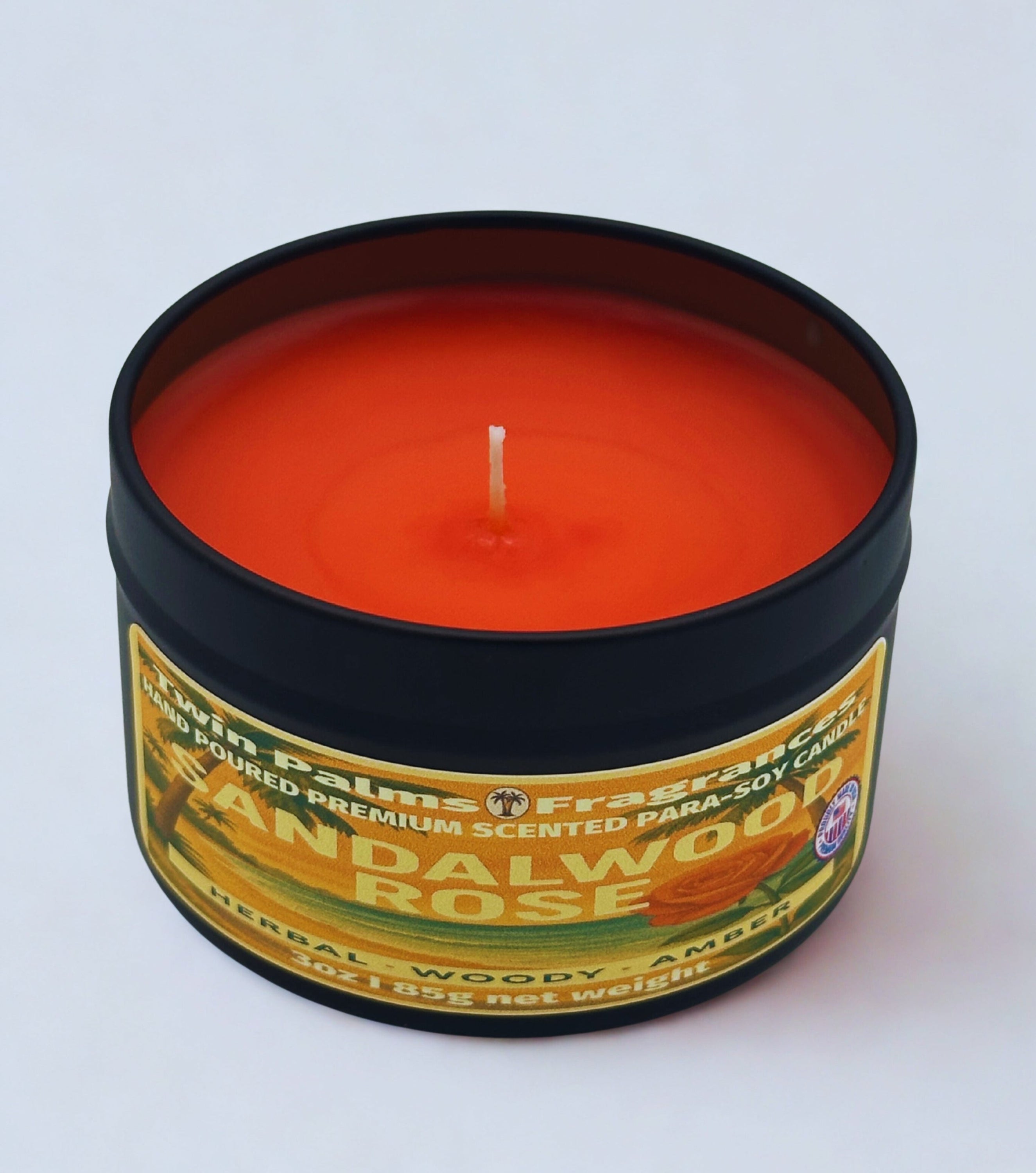 Twin Palms Fragrances scented candle Sandalwood Rose in a tin with a label on a white background