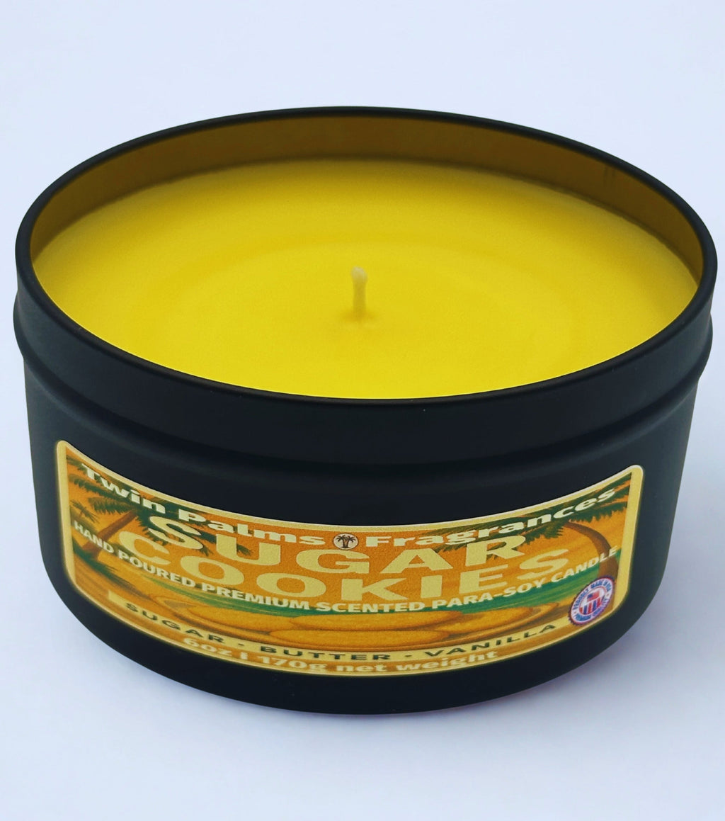 Candle in a black container with a label on a white background