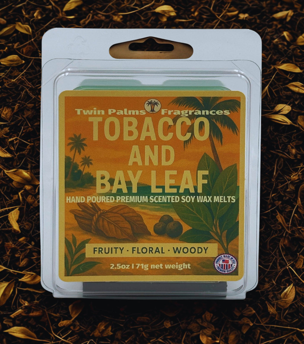 Packaging of Twin Palms Fragrances Tobacco and Bay Leaf scented soy wax melts on a leafy background.