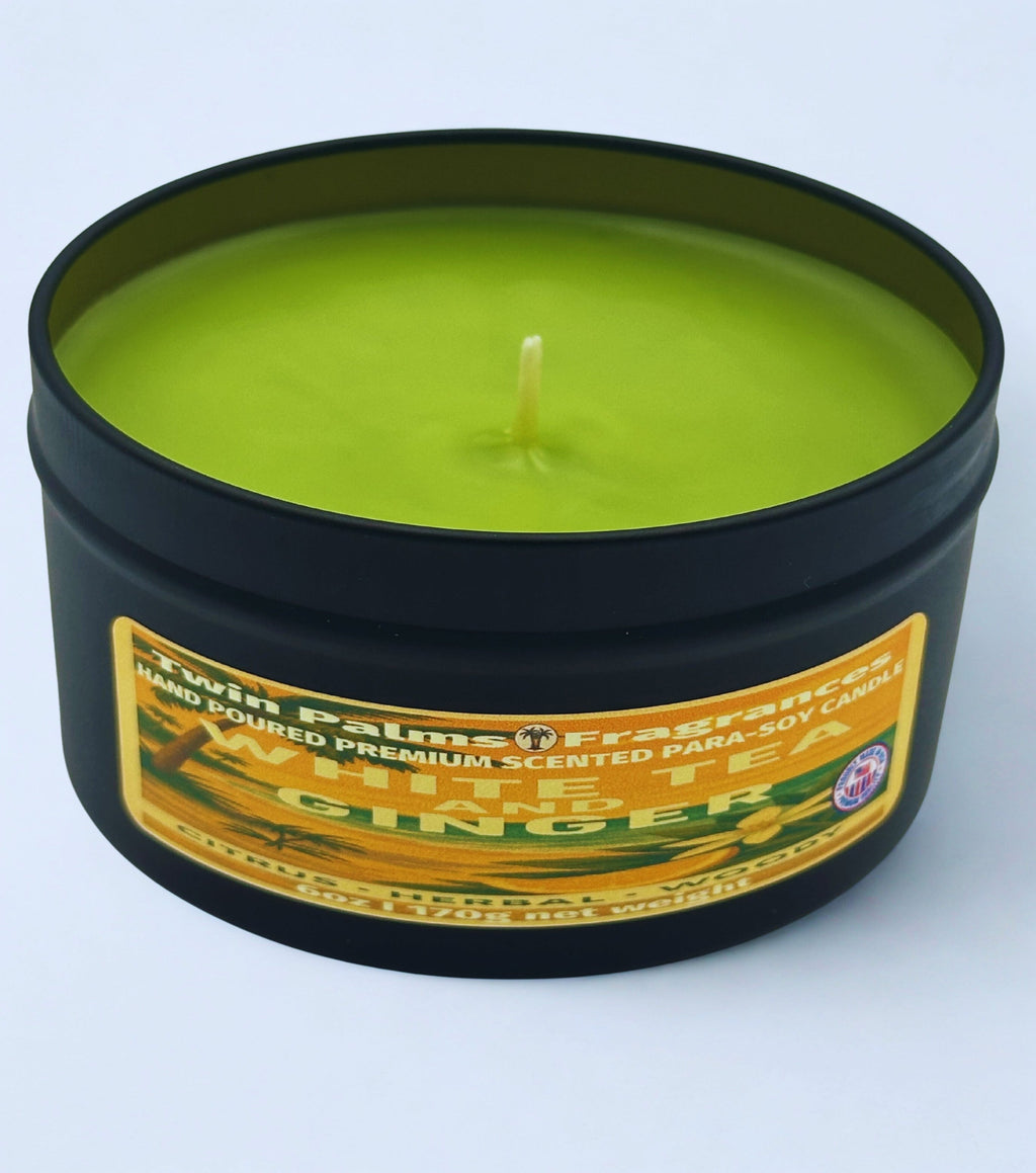 Candle in a tin container with a label on a white background