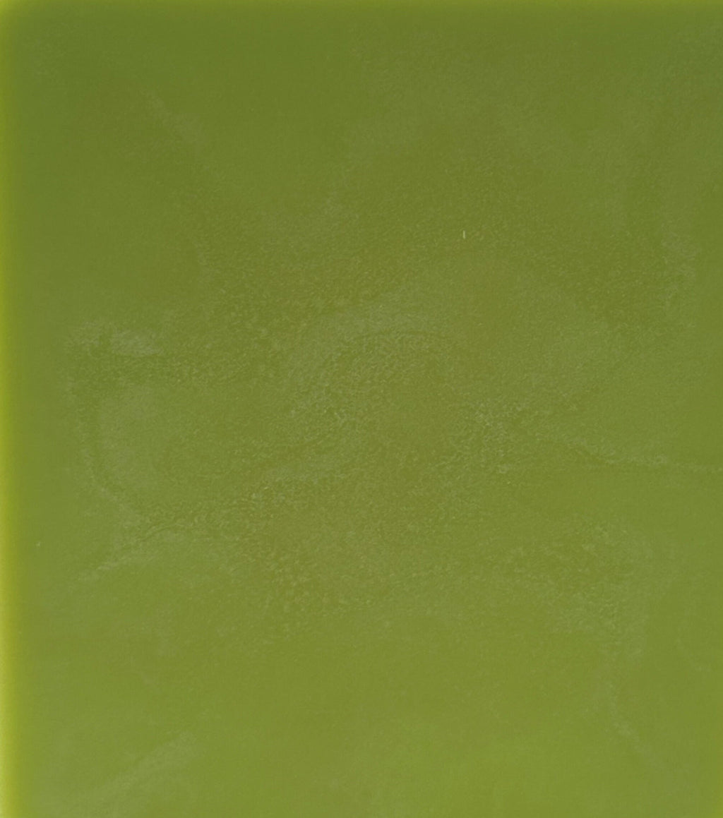Solid green color swatch with a textured surface